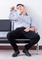 Man nervously impatiently waiting in the lobby