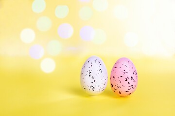 Easter background with bright bokeh with Easter egg decor