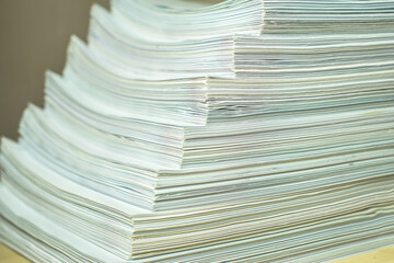 bundles bales of paper documents. stacks packs pile on the desk in the office