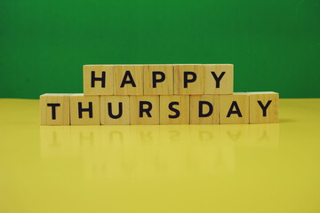 Happy Thursday alphabet letter on green and yellow background