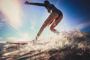 Woman Surf Blue wave. Slim woman surf. Passion - obrazy, fototapety, plakaty