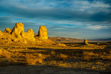 Low pinnacles at sunrise with power plant in the background