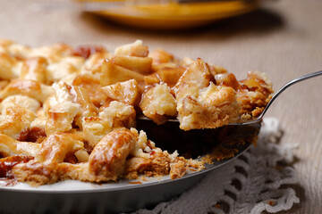 Using a server to get a slice of delicious apple pie.