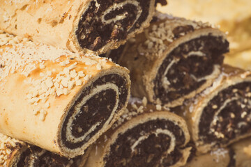 Portion of fresh homemade poppy seeds cake. Festive dessert. Vintage photo