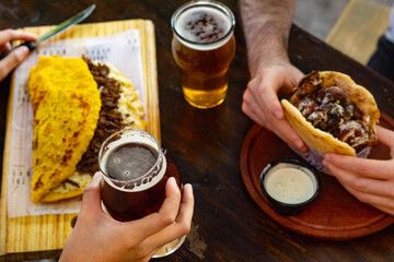 People eating in a venezuelan restaurant