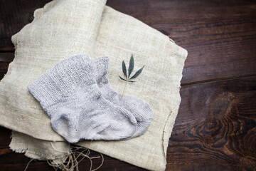 Fototapeta na wymiar cannabis sativa hemp warm fabric surface texture pattern close up