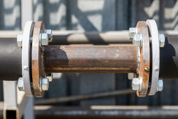 Metal pipe with flanges. Connection of pipe with flanges and welding