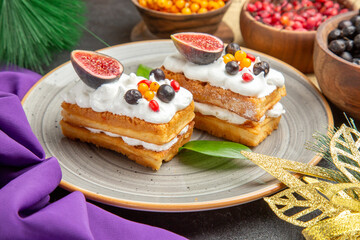 front view yummy waffle cakes with fresh fruits on a dark background sweet cake photo cream sugar dessert