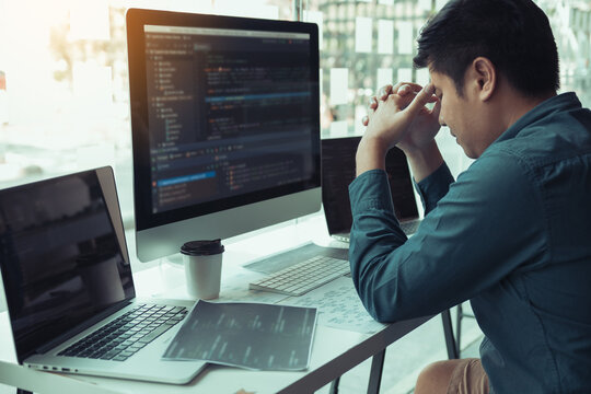 Software developers headache with code analysis in the office.