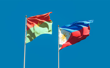 Flags of Philippines and Burkina Faso.