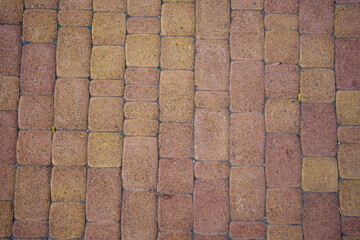 background stone pavement. road paved with cobbles. texture of bricks.