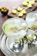 Tray with glasses of fresh martini