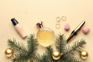 Christmas composition with cosmetics on color background