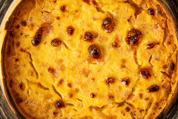 delicious round quiche with ham and homemade bacon