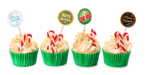 Tasty Christmas cupcakes on white background