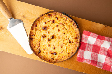 delicious round quiche with ham and homemade bacon