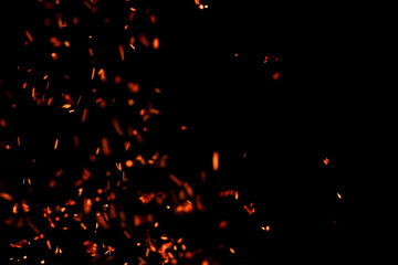 flame of fire with sparks on a black background