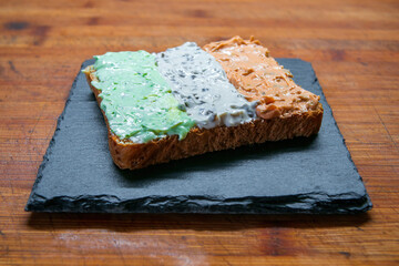 a delicious fresh bread with herb cream for the breakfast