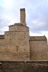 the side oh the Romanesque church of Sant Miquel de Olerdola, Barcelona province, Catalonia, Spain