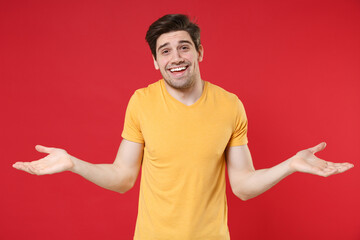 Young indignant troubled confused unshaved caucasian handsome man 20s in casual basic blank print...