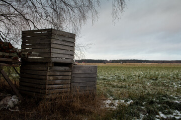 Wooden Crates On The Frosty Fields