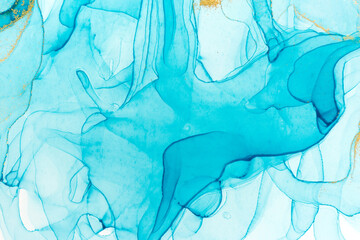 Chaotically splattered blue transparent ink stains. Abstract watercolor background.