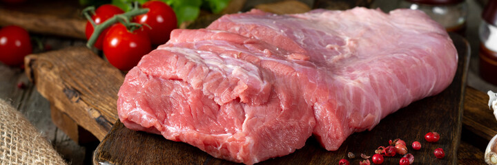 Beef meat. Raw beef meat on a wooden Board on a wooden table. Rustic style