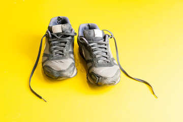 Sports shoes for running. Battered old sneakers. Sneakers after years of running