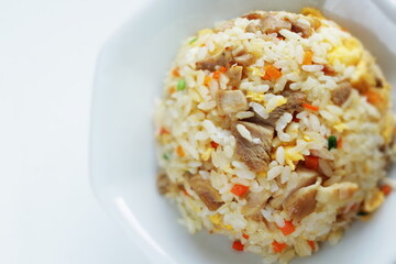 homemade chicken fried rice on chinese plate