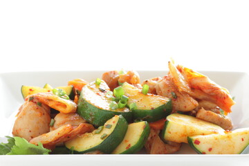 Korean food, cucumber and chicken stir fried with kimchi

