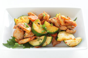 Korean food, cucumber and chicken stir fried with kimchi
