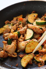 Korean food, cucumber and chicken stir fried with kimchi
