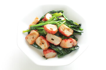 Chinese food, fish cake and green leaf vegetable Spinach stir fried
