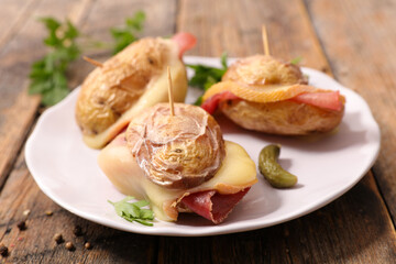 baked potato with cheese and ham