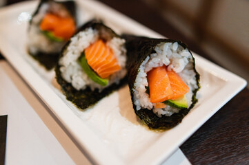 sushi, food, japanese, fish, seafood, meal, rice, japan, dinner, healthy, salmon, asian, fresh, traditional, gourmet, raw, cuisine, asia, lunch, white, roll, seaweed, delicious, diet, restaurant, plat