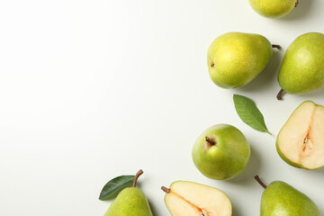 Fresh green pears on white background, top view