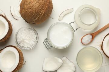 Fresh coconut and coconut milk on white background