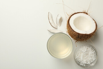 Fresh coconut and coconut milk on white background