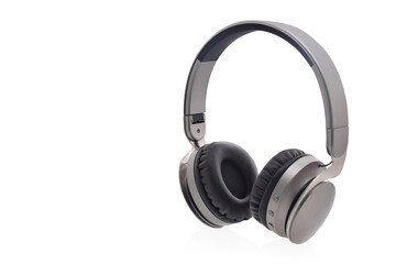 Fototapeta na wymiar gray and black headphones on white background, object, technology, copy space