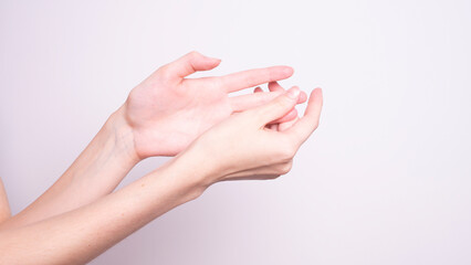 Close up of tremor (shaking) hands of Middle-aged women patient with Parkinson's disease. Mental health and neurological disorders.