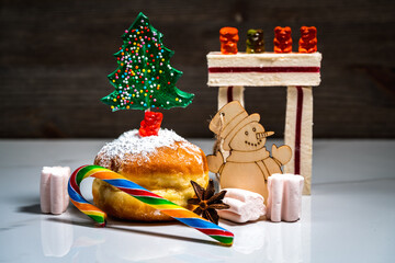 christmas tree lollipop and doughnuts with sugar powder (jewish holiday Hanukkah)