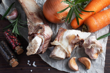 Beef bone and vegetable ingredients for cooking broth. Healthy food with collagen and amino acids....