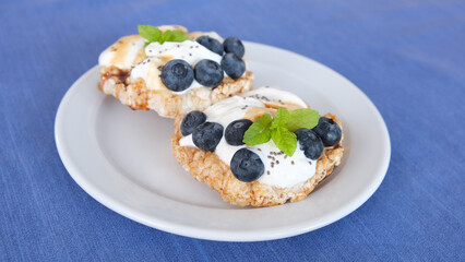 Sandwiches with cream cheese and blueberries