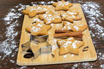 christmas gingerbread cookies on a cutting board