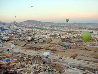 Panorama of the picturesque snow-white sharp-topped volcanic rocks of Cappadocia from the height of...
