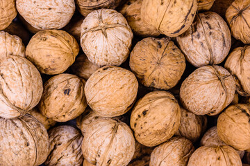 Heap of many walnuts for the background