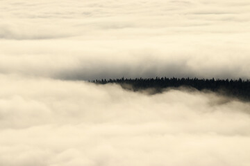 view of clouds in the mountains