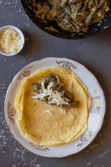French style crepes with artichokes and bèchamel sauce