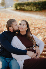 Fototapeta premium Young adult couple in love in autumn Park
