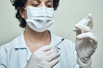 View of a Nurse preparing vaccine dose